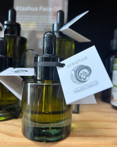 Face oil in bottle on shelf