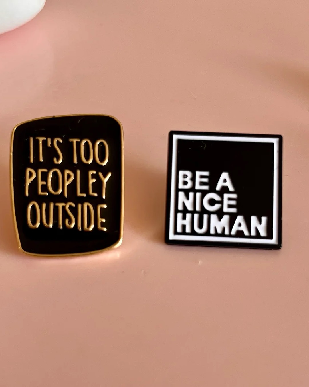 Black and white pin with be a nice human