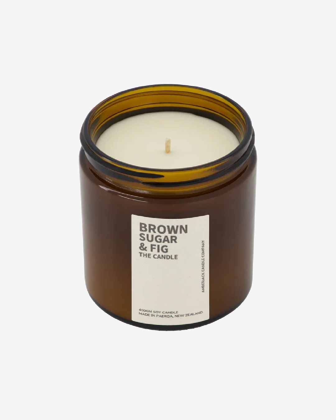 Brown sugar and fig candle in amber jar