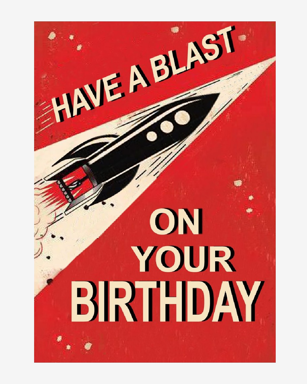 rocket ship on card in red