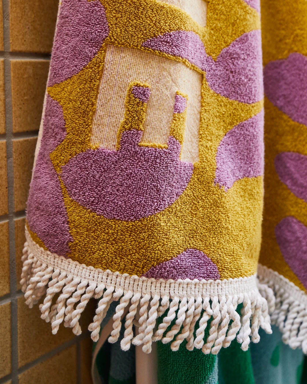 Purple and yellow nudie rudie towel