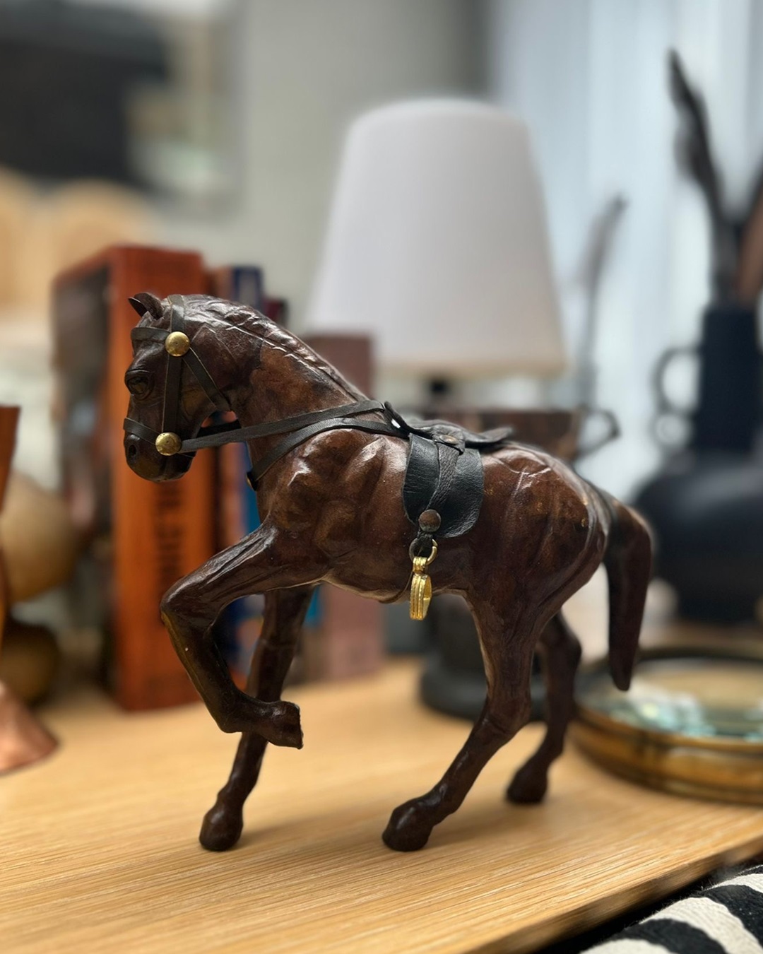 Leather horse with saddle and bridle stirrups collectable on wooden