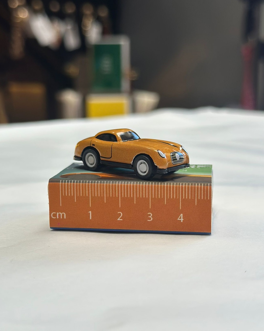 Micro mini orange toy car