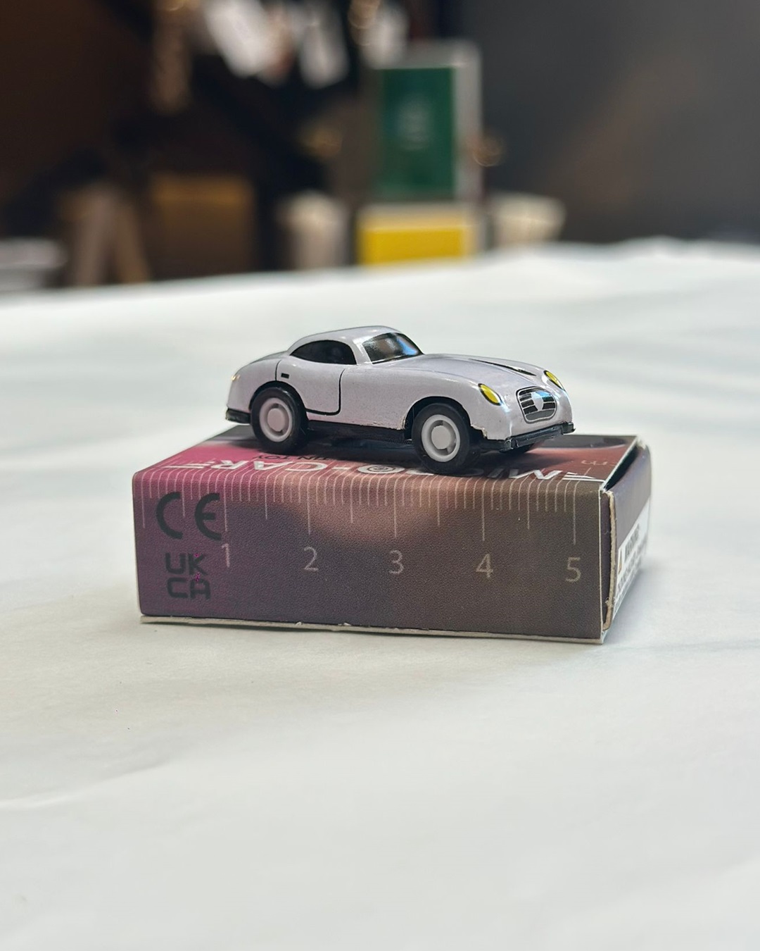 Micro mini white toy car