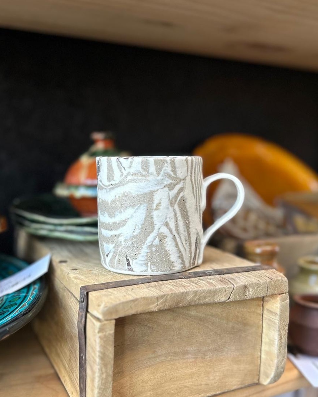 Natural Nerikomi ceramic mug on shelf