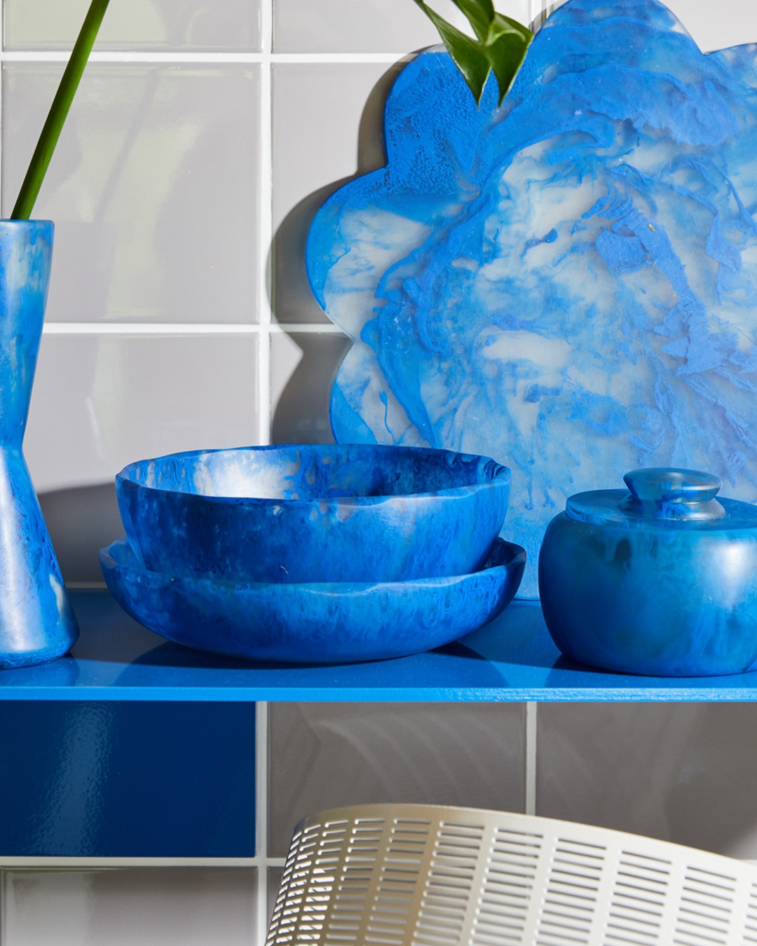 Blue bowl and blue pot on blue table