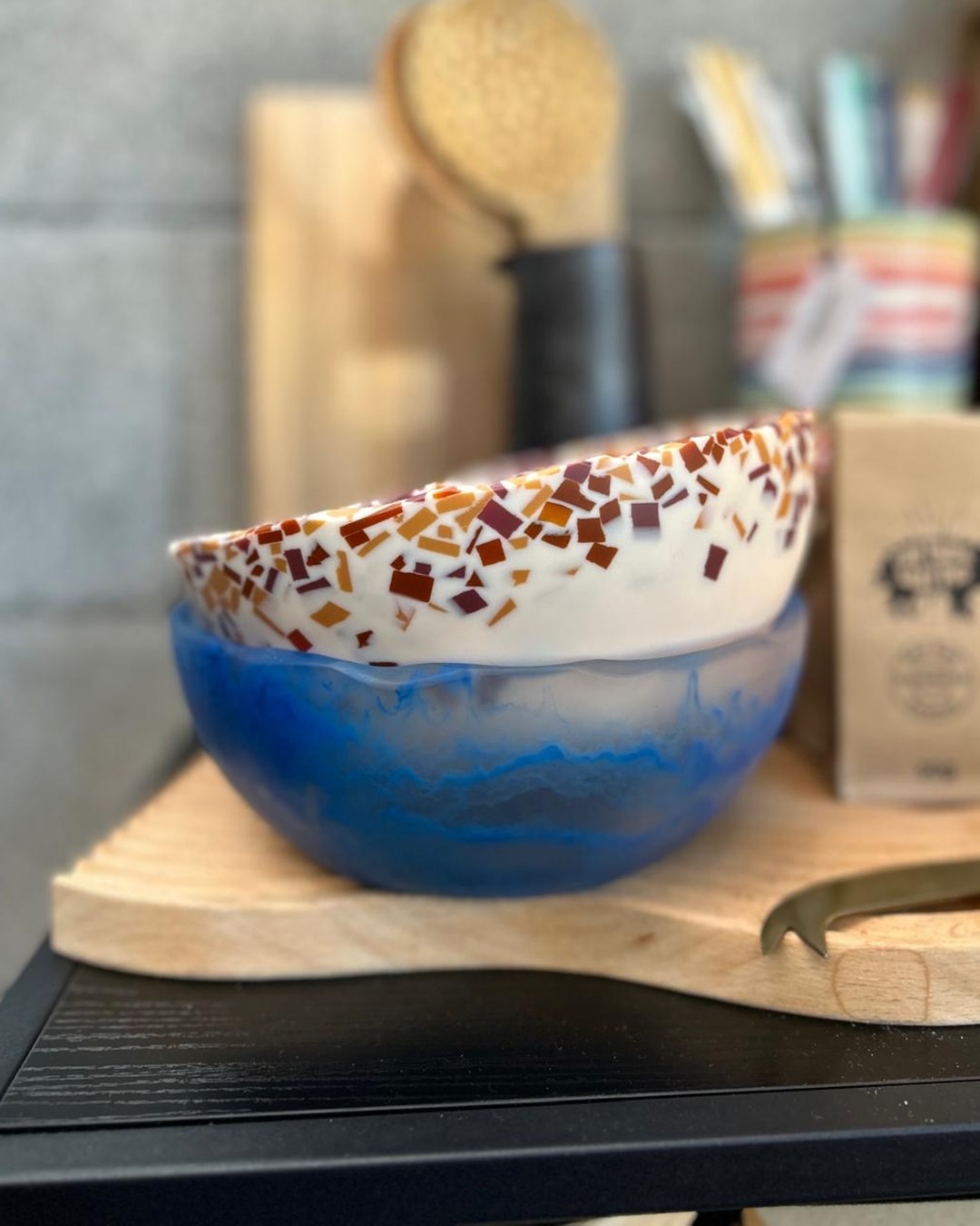 Blue and terrazzo bowl on wooden bench