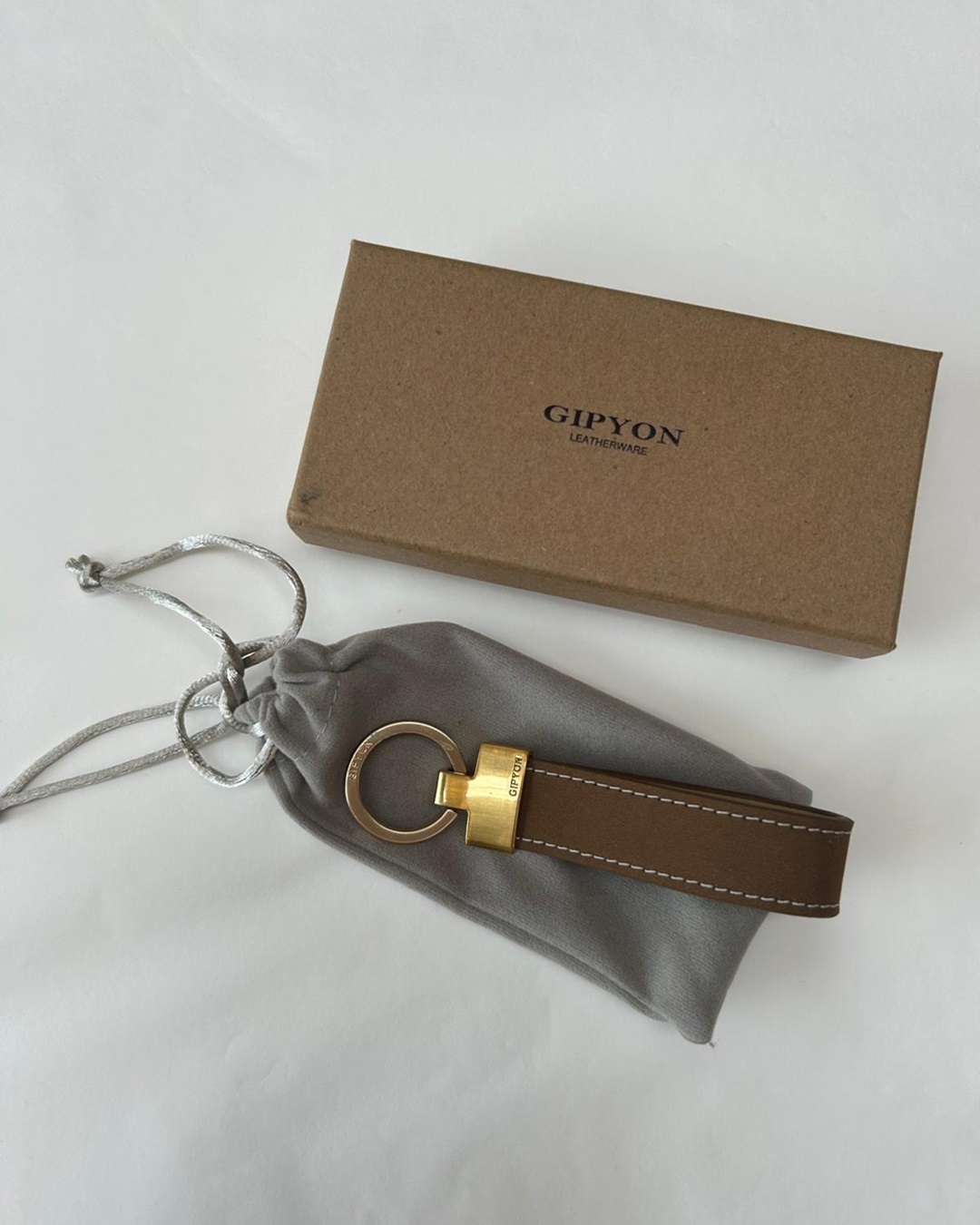 Suede leather coffee coloured keyring with box