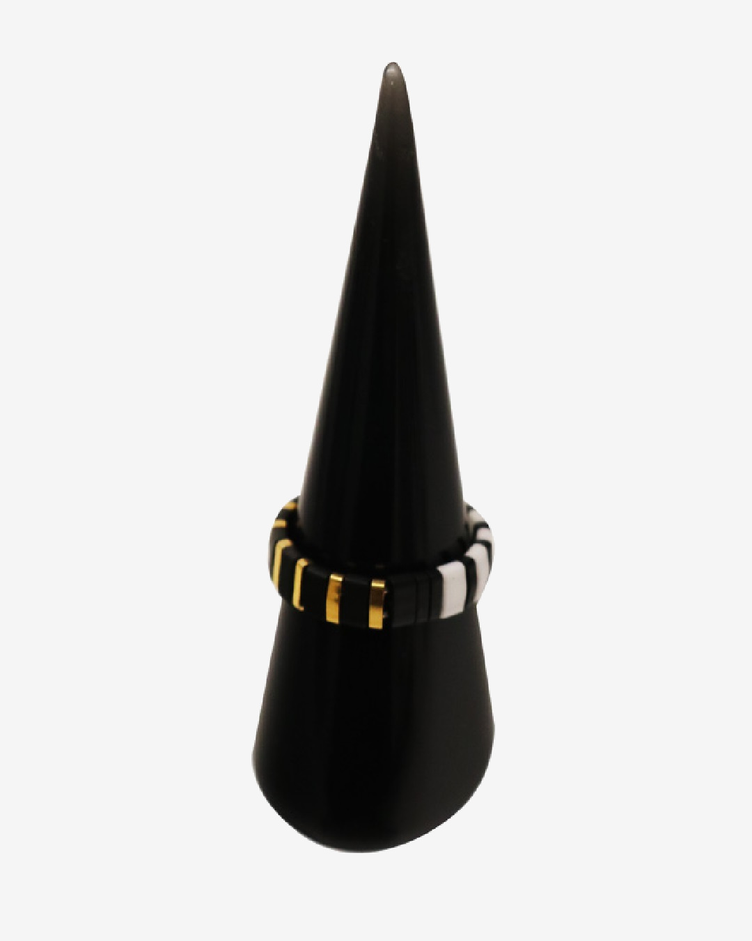 Black white and gold striped bead ring on black cone