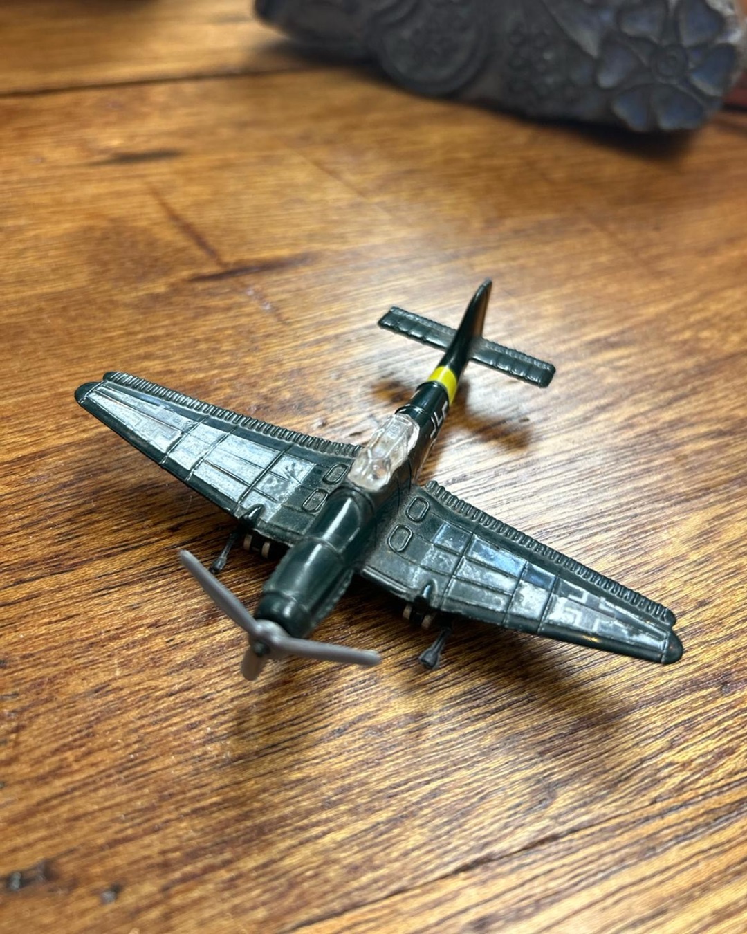 Vintae Dyna Flites plane collectable on wooden table