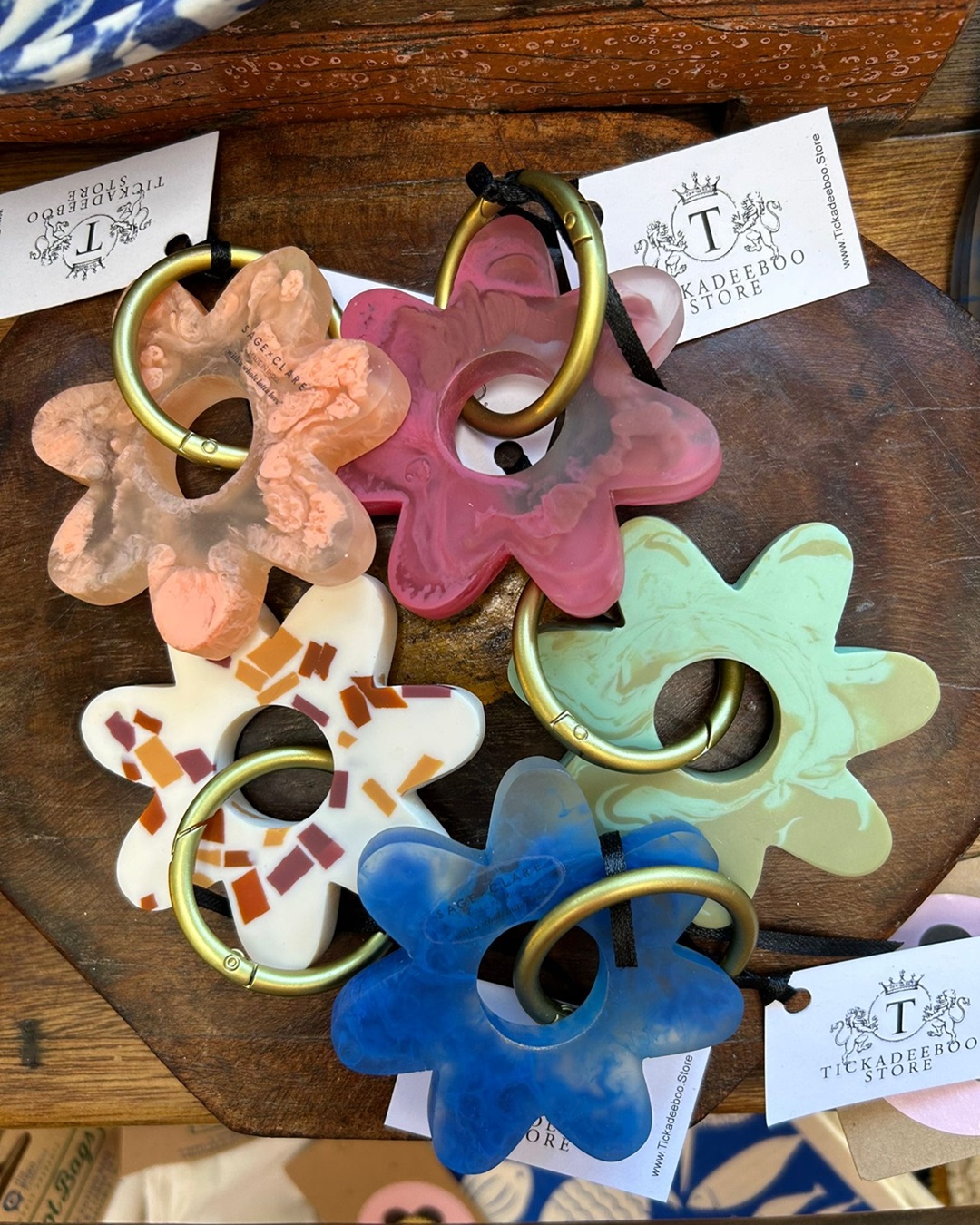 Flower colourful keyrings on wooden table