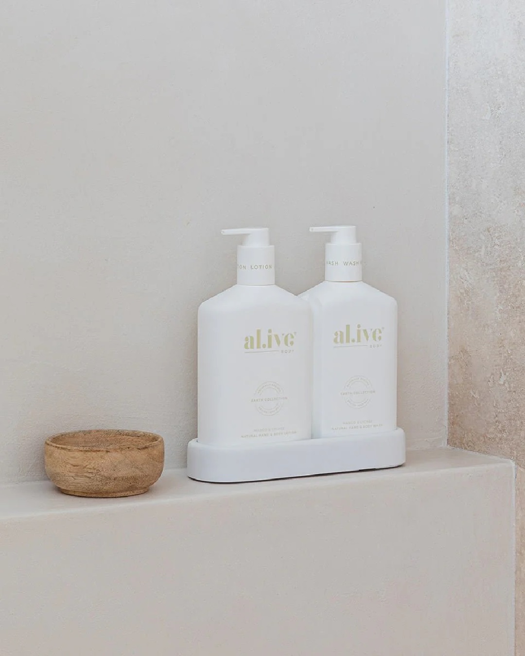 Al.ive wash and lotion duo in tray on shelf